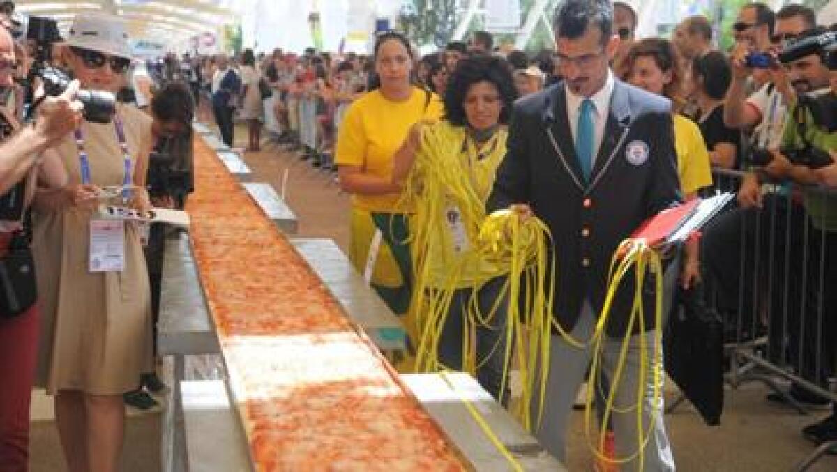 Expo, pizza da Guinness dei Primati: è lunga più di 1,5 km - 
