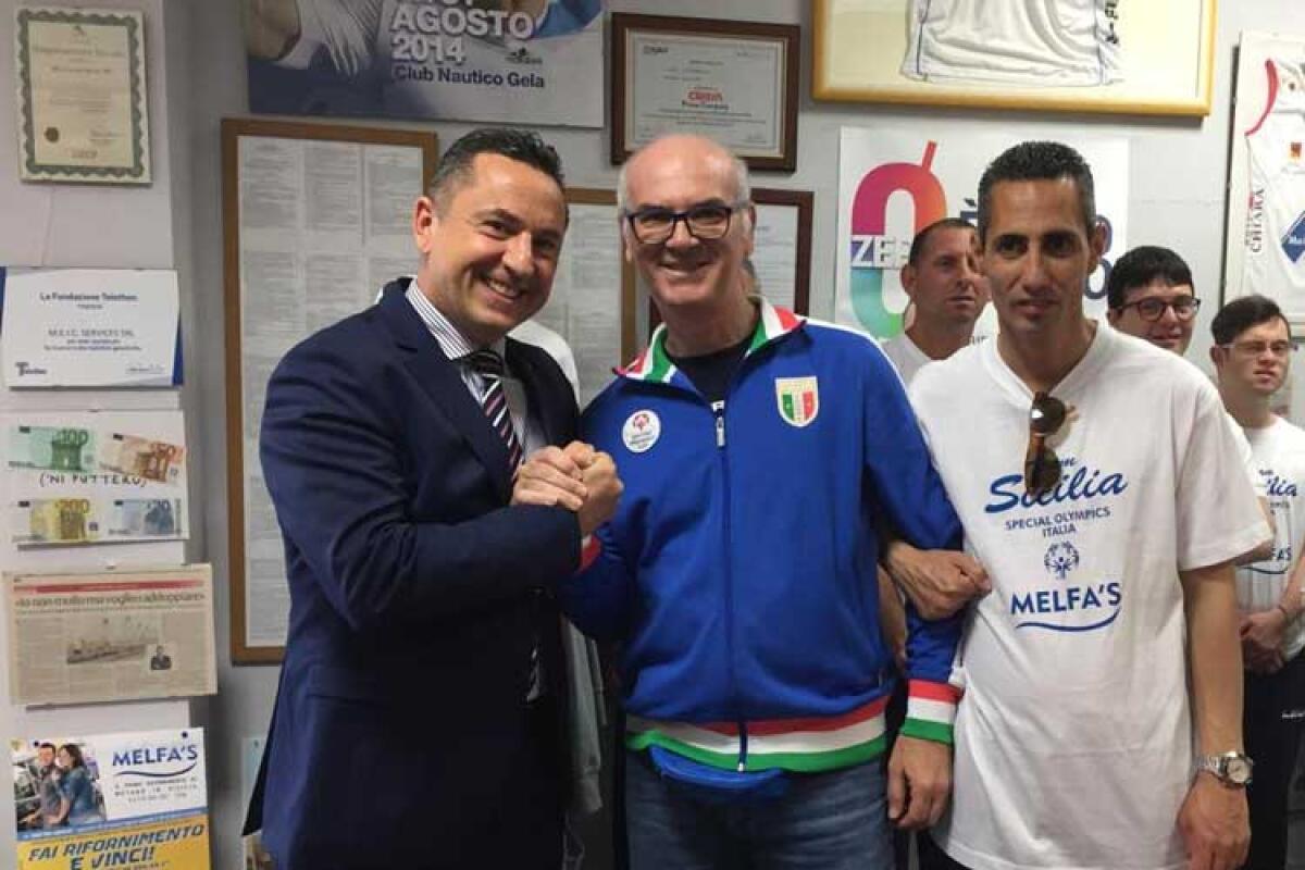 Si allarga la "famiglia" degli atleti speciali dell'Orizzonte con la Meic Services - Maurizio Melfa e Natale Saluci con alcuni atleti dello Special Olympics.