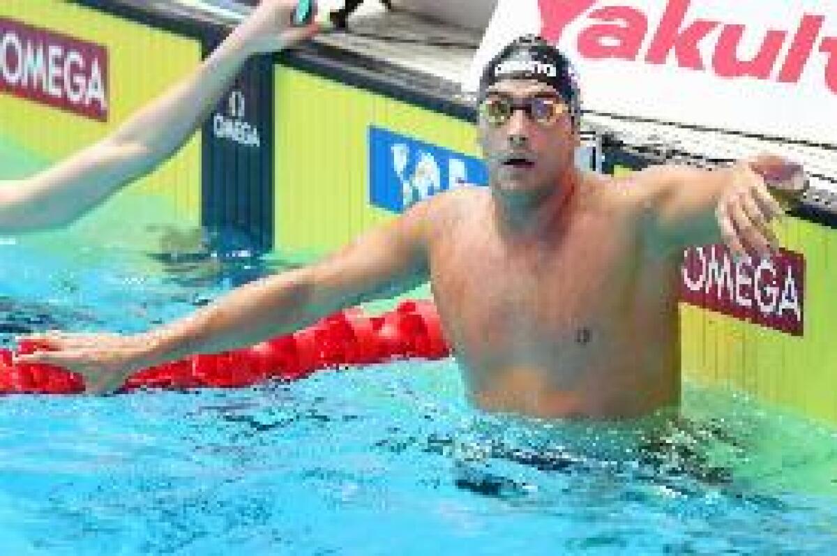 BRONZO MONDIALE PER DETTI NEI 400 SL, VINCE YANG, PROTESTA HORTON - 