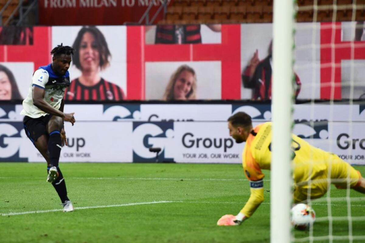 Zapata risponde a Calhanoglu, pari fra Milan e Atalanta - 